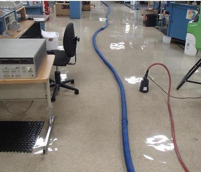 hose and pump, office area, water on floor