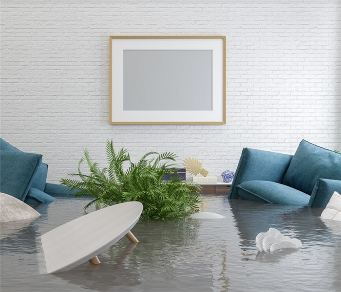 furniture floating in flooded room